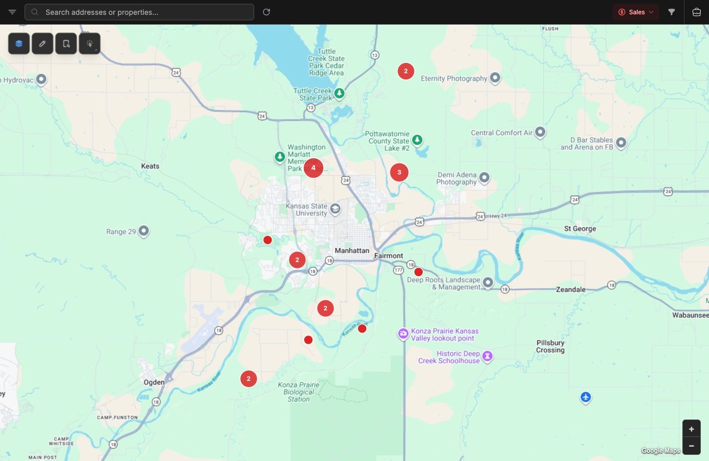 Interactive map workspace with property markers, layer tools, search, and map controls